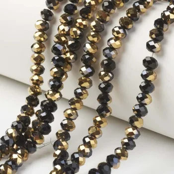 Cristal negro y dorado 4x3mm