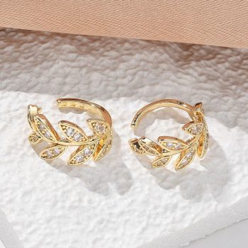 Earcuff hojas micropave transparente y baño oro 18k