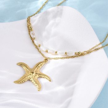 Collar doble acero inoxidable y conchas con dije estrella de mar