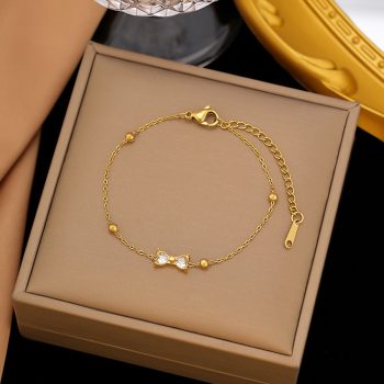Pulsera lazo de zirconia y acero inoxidable dorado