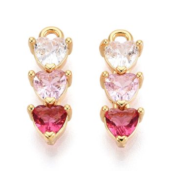 Dije corazón triple zirconia tono rosa  baño oro 18k 16x5x3mm